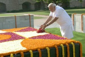 Modi at Raj Ghat offering tribute to Mahatma Gandhi