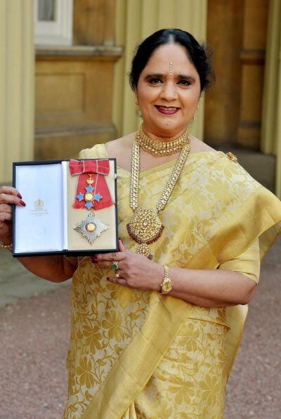 NRI Asha Khemka dazzles in saree at Buckingham Palace as Prince Charles awards her Damehood Indian-born Asha Khemke, who was awarded Damehood at Buckingham Palace, wore a traditional white and gold silk saree for the ceremony
