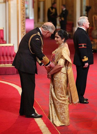 NRI Asha Khemka dazzles in saree at Buckingham Palace as Prince Charles awards her Damehood Dame Asha's inspiring journey -- from being a housewife for 20 years to being a principal and chief executive of a college -- earned her a Damehood