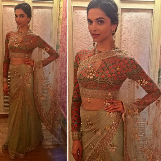 Deepika Padukone looking regal in a orinted full sleeve bluse and glittery saree for Bajirao Mastani promotions