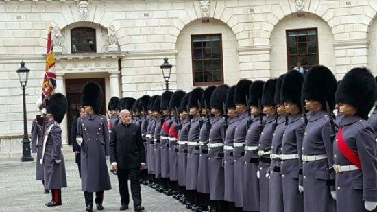 Narendra Modi UK visit 2015: Pics of electric atmosphere at Wembley Stadium for 'UKWelcomesModi' community reception Indian PM takes a look at the immaculate Guard of Honour in the UK